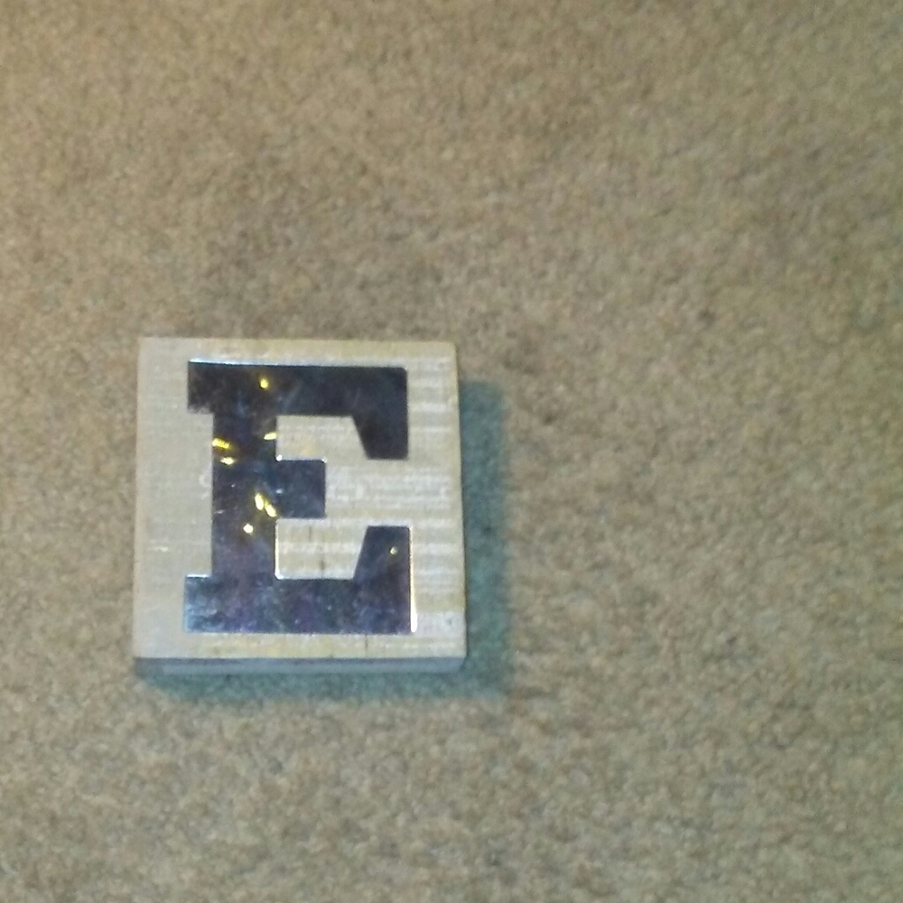 'E' wall art